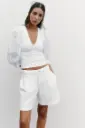 BLUSA MANGA ABULLONADA